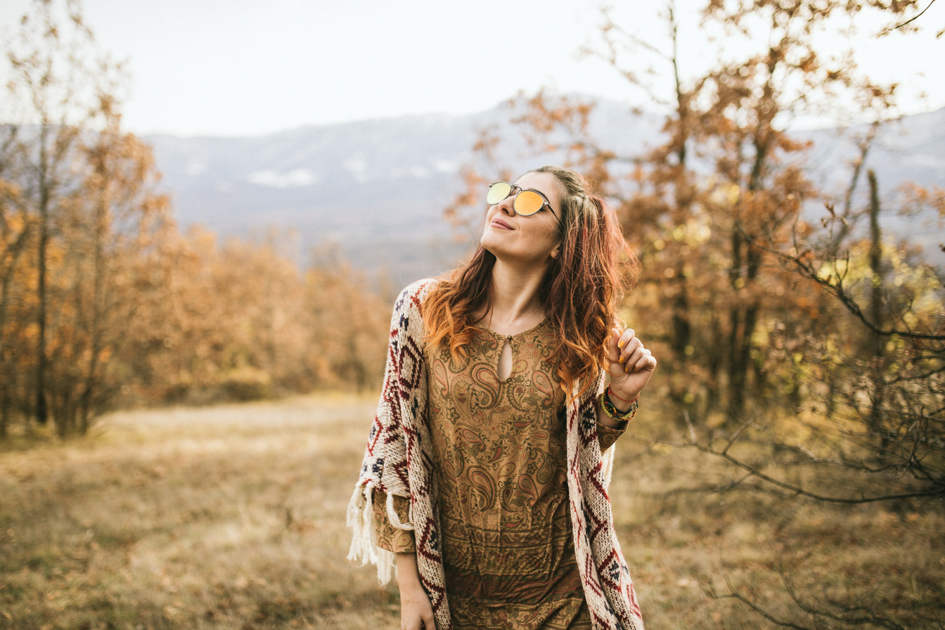 Happy hippie woman enjoying outdoor